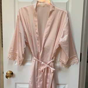 Peach color robe lace trim. Smoke & pet free home